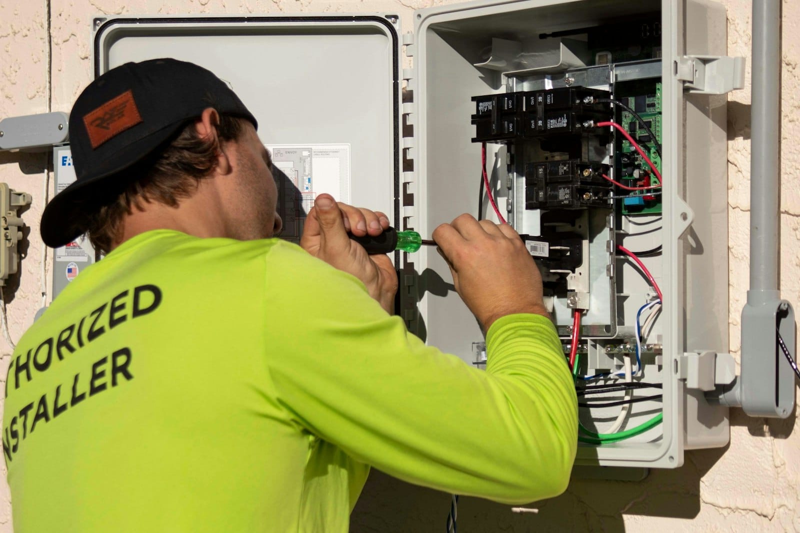 Electrician working on a switchboard